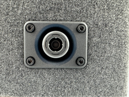 Duskie Nitto Legris coupler with panel kit and 12mm barb, silver metal coupler with blue rubber seal on grey textured panel.