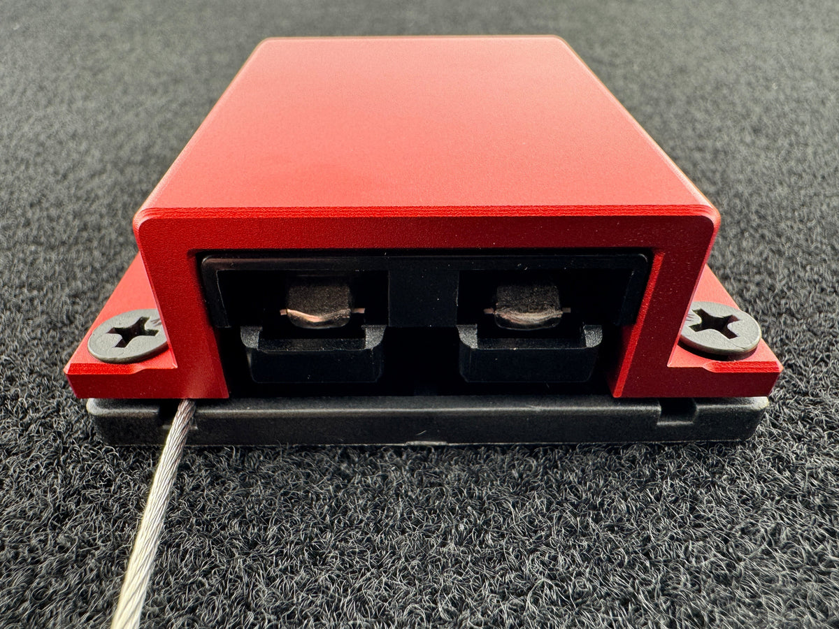 Duskie red billet aluminium housing with 2-way 50A connector and dust cap wire.